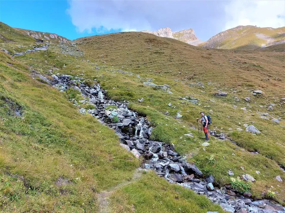 Grenzfluss im Malfragtal auf dem Wanderweg vom Alptrider Sattel und Alp Bella zur Fliesser Alp